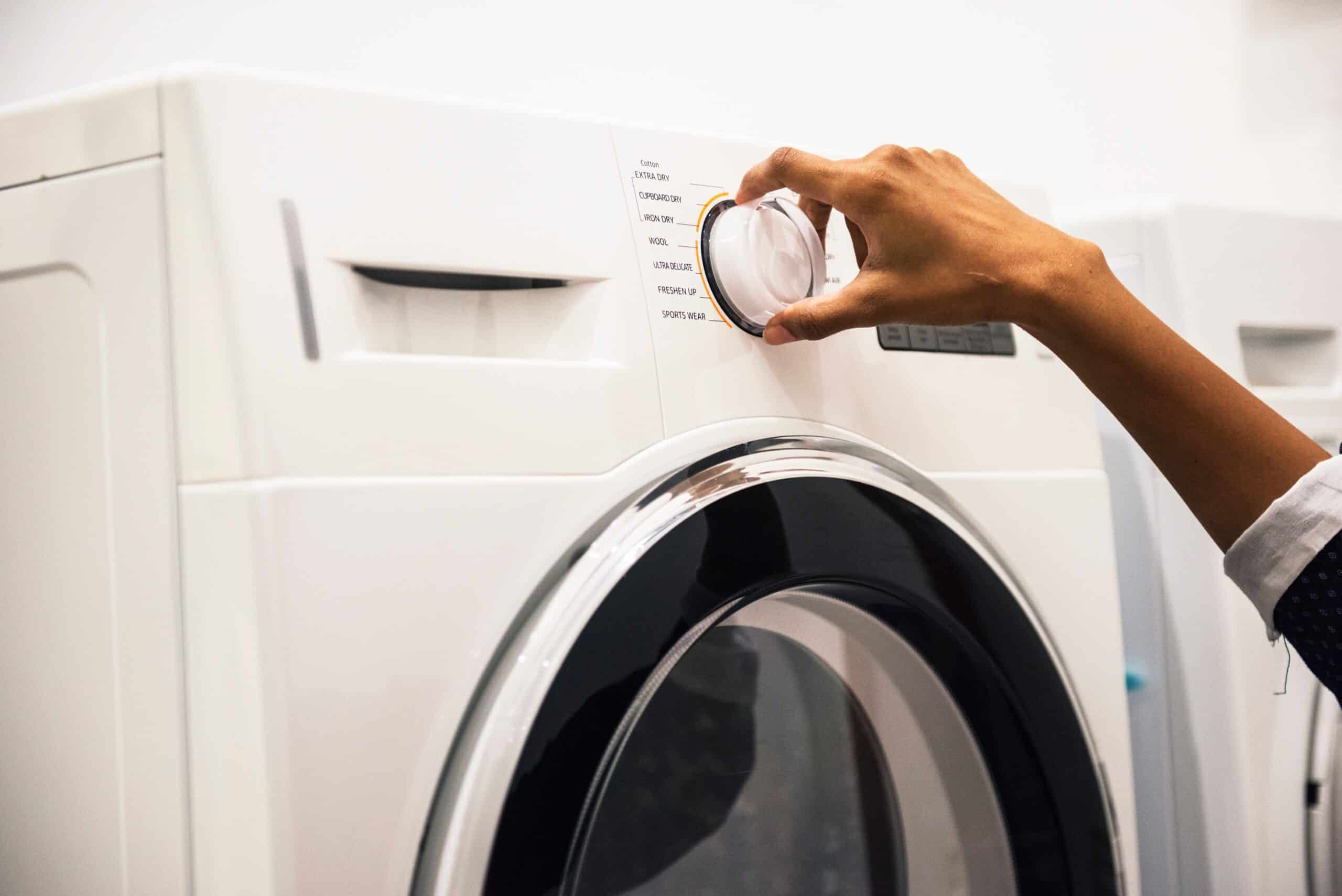 Bouton allumer d'une machine à laver le linge